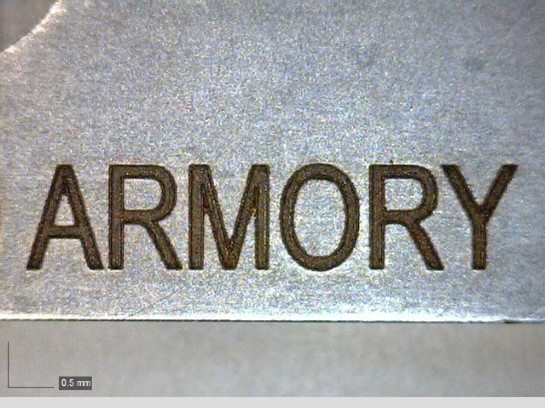 Federal guidelines require markings must be 0.003 inches deep. The mark below was created using a SMARTmark® Fiber Laser
